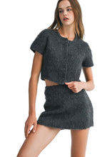 Load image into Gallery viewer, Woman wearing a dark gray skirt set in a textured fabrication
