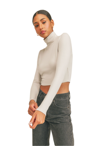 Sage the Label cropped turtleneck in antique white.